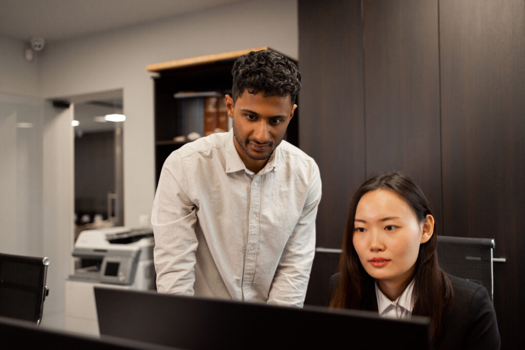 Man and woman at computer